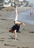 th_24581_missy_celeb-city.org_Phoebe_Price_does_cartwheels_in_the_sand_009_123_634lo.jpg